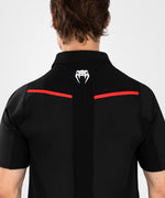 Load image into Gallery viewer, UFC Venum Performance Institute 2.0 Men’s Polo Shirt - Black/Red
