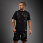 Load image into Gallery viewer, Venum Serpenti Dry Tech T-Shirt - Black/Silver/Gold
