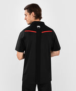 Load image into Gallery viewer, UFC Venum Performance Institute 2.0 Men’s Polo Shirt - Black/Red
