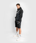 Load image into Gallery viewer, UFC VENUM Authentic Fight Week Men&#39;s Shorts - Black
